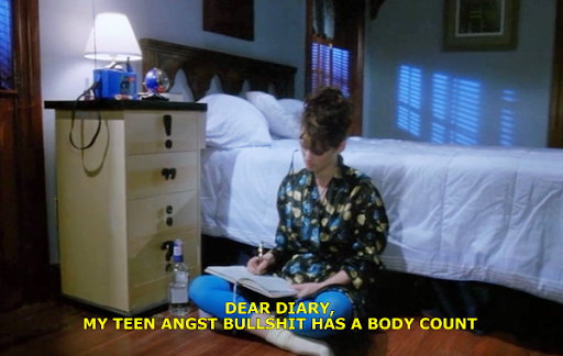 picture of winona in heathers sitting writing in her diary